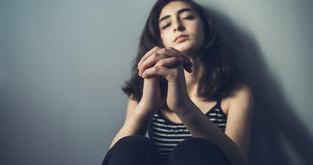 Wall Mural - praying woman in the room