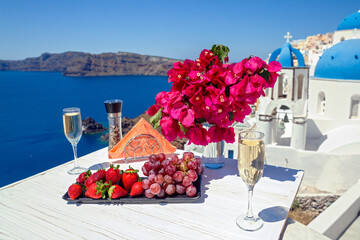 Wall Mural - Wine and fruit on the table for two