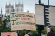 Black Lives Matter protest in London. Injustice banner