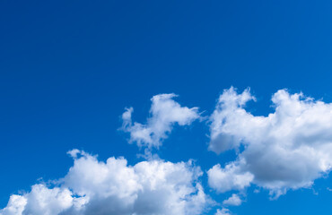 soft white clouds against blue sky background...abstract nature background of beautiful clear blue s