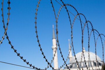 Wall Mural - Barbed-wire fence near the mosque in Istanbul, Turkey