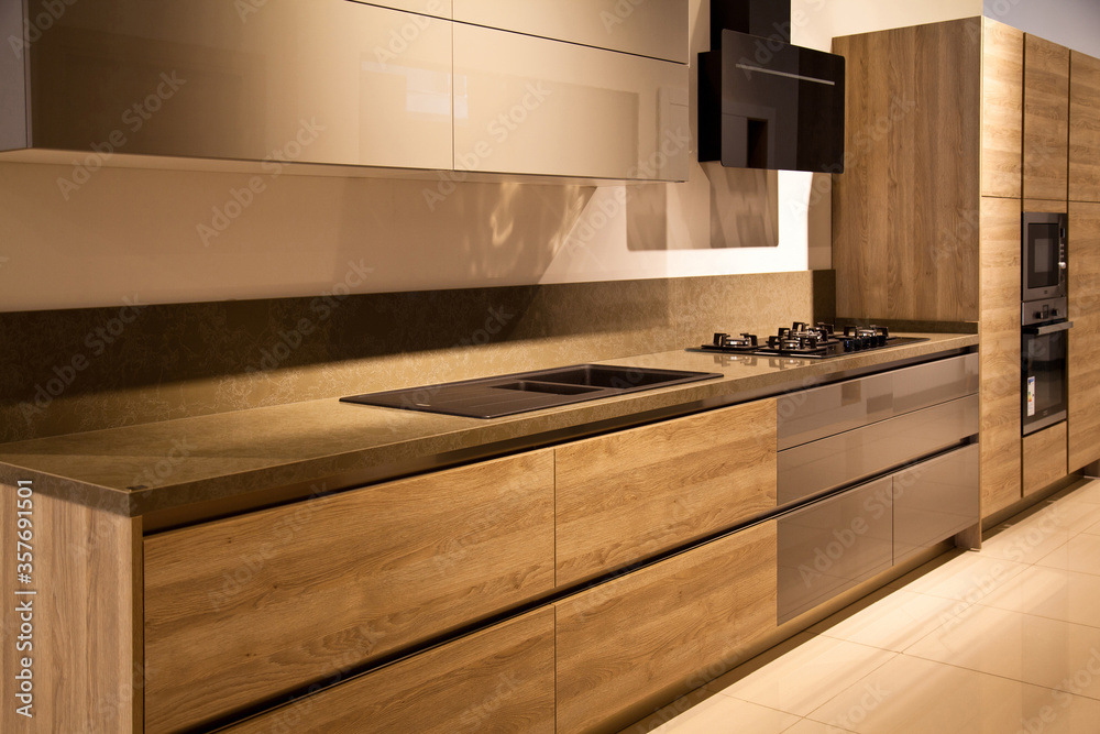 Interior of modern kitchen equipment, grey and oak cabinets Stock Photo ...