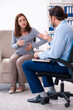© Elnur - Pregnant woman visiting young male psychologist