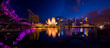 panoramic reflection view of Singapore's landmarks at Marina Bay Singapore city captured at night, from bridge to office buildings. for background and wallpaper