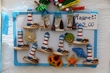 Magnets in a souvenir shop in the old town of Polignano a Mare, Puglia, Italy