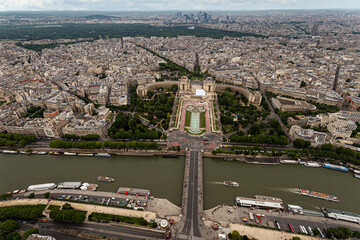 Wall Mural - Aerial view from the Eiffel tower on Paris city, Champs de Mars, Trocadéro and skyline toward La Défense business district, France