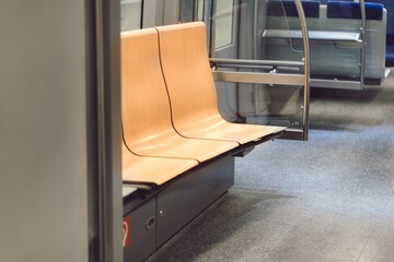 Poster - Closeup shot of several seats next to each other in the metro