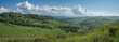 © Valerii - Picturesque valley, panoramic mountain view. Bright sunlight, spring greens of forests and meadows.