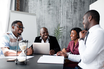 Morning meeting-conference of black employees of the company to discuss exciting issues at the beginning of the working day