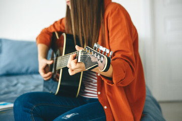 Wall Mural - The guitarist plays the guitar