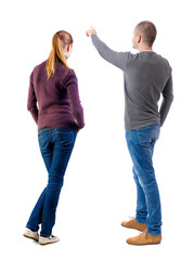 Canvas Print - Back view of couple in sweater pointing.