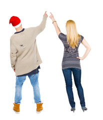 Canvas Print - Back view of couple in sweater pointing.