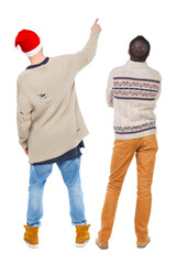 Poster - Back view of two man in sweater pointing.