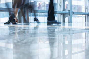 Blurred motion of people walking