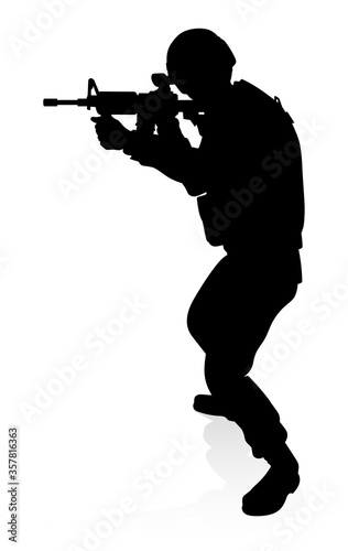 Silhouettes of a military a...
