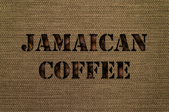 Varieties of Jamaican coffee text made up of coffee beans on a background of canvas fabric