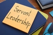 Servant Leadership is shown on the conceptual business photo