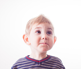 Closeup portrait of a surprised baby boy