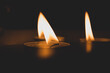 © Anat art - three candles in the dark, close up