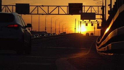 Wall Mural - Traffic on the urban thoroughfare, overpass,  at sunset