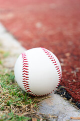 Poster - close up baseball on the infield, sport concept