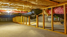 Panorama Basement Or Crawl Space With Upper Floor Insulation And Wooden Support Beams
