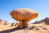 Fototapeta  - Mushroom rocks. Stone landmark in red desert Wadi Rum, popular tourist attraction in Jordan.