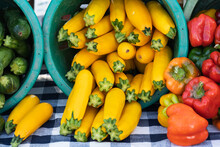 Bright Colorful Produce At The Farmers Market With Yellow Summer Squash