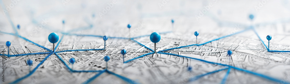 Find your way. Location marking with a pin on a map with routes. Adventure, discovery, navigation, communication, logistics, geography, transport and travel theme concept background. - obrazy, fototapety, plakaty 