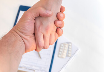 Aufkleber - doctor shakes hand with another doctor or patient in hospital, concept of teamwork. male and female shake hands