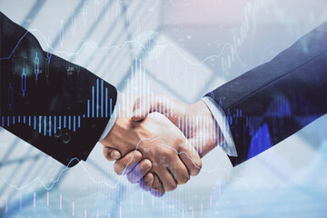 Double exposure of forex graph hologram and handshake of two men. Stock market concept.