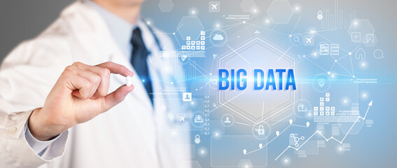 Doctor giving a pill with BIG DATA inscription, new technology solution concept