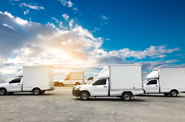 Commercial delivery trucks parked at a blue sky. shipping cargo service.