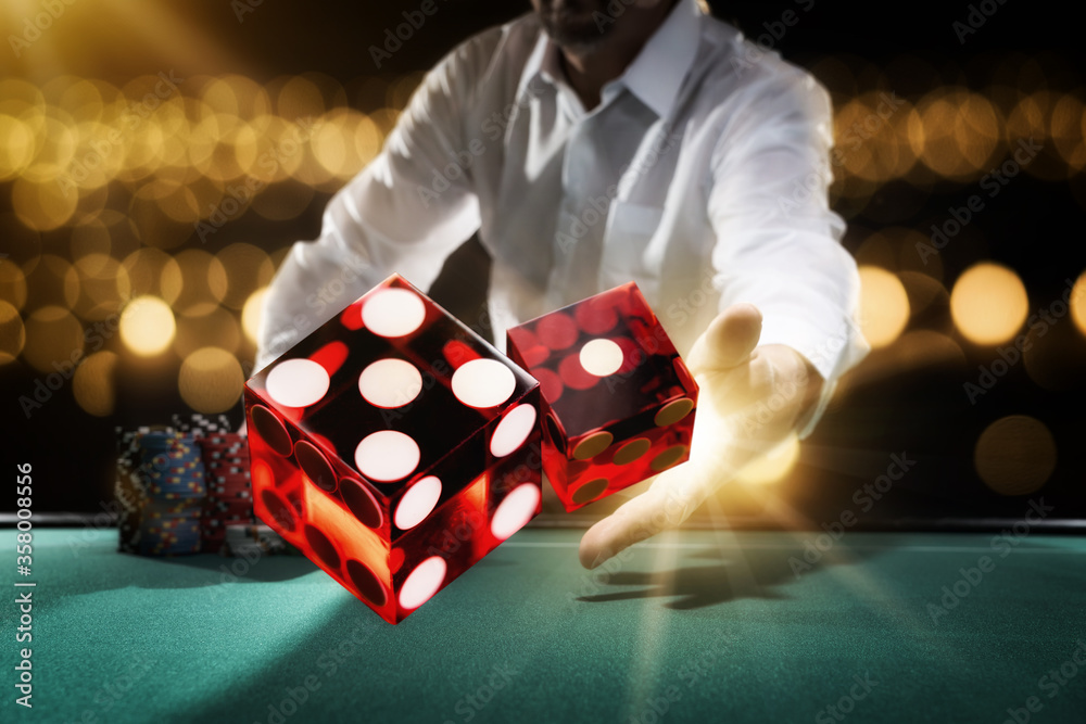 Man gambling at the craps table