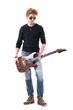 © sharplaninac - Serious stylish young rock music artist posing with wooden electric guitar looking away. Full body length isolated on white background.
