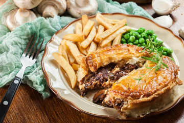 Wall Mural - Homemade beef stew pie with french fries