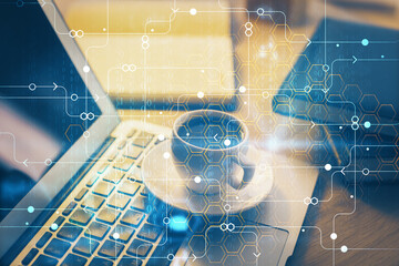 double exposure of desktop computer and technology theme hologram. concept of software development.