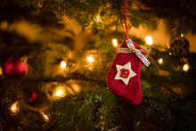 Traditional Advent Calendar Stocking With The Date Of The 19th Of December Hanging On A Traditional Christmas Tree.