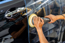 Man Hands Holding The Work Tool Polish The Car.Buffing And Polishing Car. Car Detailing.