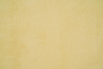 Wall Mural - Yellow stucco texture. Architectural abstract background. Yellow wall of building.