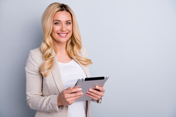 Sticker - Close-up portrait of her she nice attractive charming skilled cheerful wavy-haired lady holding in hands using tablet finance hr it market research isolated on light white gray pastel color background