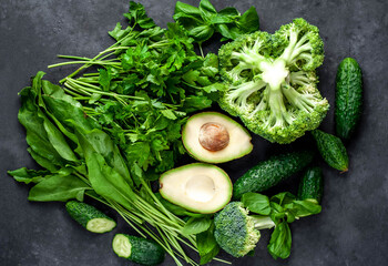 Set of raw healthy food for vegetarians  on a stone background