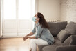 © SB Arts Media - Lonely woman suffering from depression at home during coronavirus lockdown and social distancing