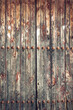 Old wooden texture with rivets, grunge aged door