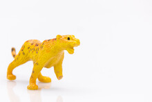 Close Up Of A Plastic Panther Toy Isolated On A White Background
