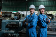Engineer men wearing uniform safety workers perform maintenance in factory working machine lathe metal, industry work man concept.