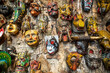 © katiekk2 - wall covered in tradtional masks in Antigua, Guatemala