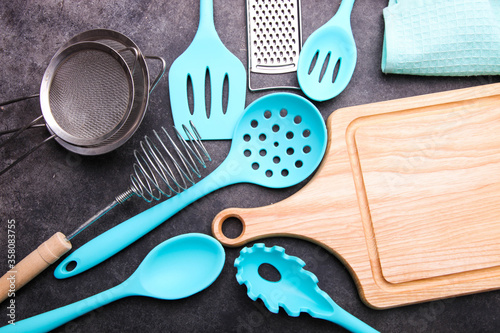 Fotomural Set of different kitchen utensils and cutting board