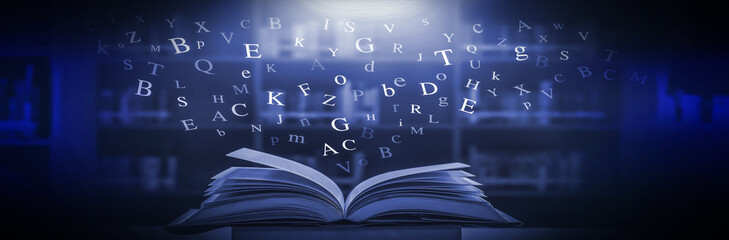 Poster - The concept of education by planting a tree of knowledge in the opening of an old book in the library and the magical magic of light that flies to the destination of success. Beautiful background