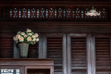 Wall Mural - Interior design in Thai style with Flower jar and Antique lamp, Thai Style architecture.